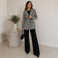 Blazer Feminino Tweed Preto e Branco botões dourados e possui bolsos 