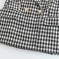 Blazer_feminino_xadrez_preto_e_branco_detalhe_da_barra
